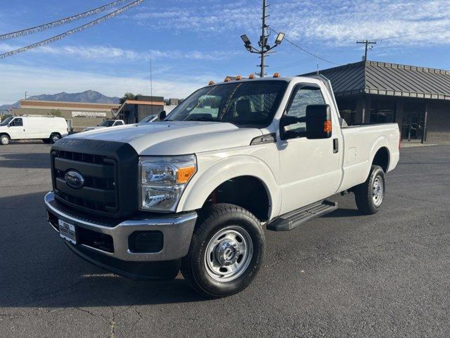 2015 White /gray Ford Super Duty F-250 SRW (1FTBF2B65FE) with an 8 6.2L engine, Automatic transmission, located at 3240 Washington Blvd., Ogden, 84401, (801) 621-7177, 41.204967, -111.969994 - *2015 Ford Super Duty F-250*Command the jobsite in this rock solid *4wd Super Duty with the 6.2L V8 engine!*This super clean truck is outfitted with vinyl seats, cruise control, power windows, locks, and mirrors! It also includes CD player with AUX input, running boards, tow package, spray-in bead l - Photo#0