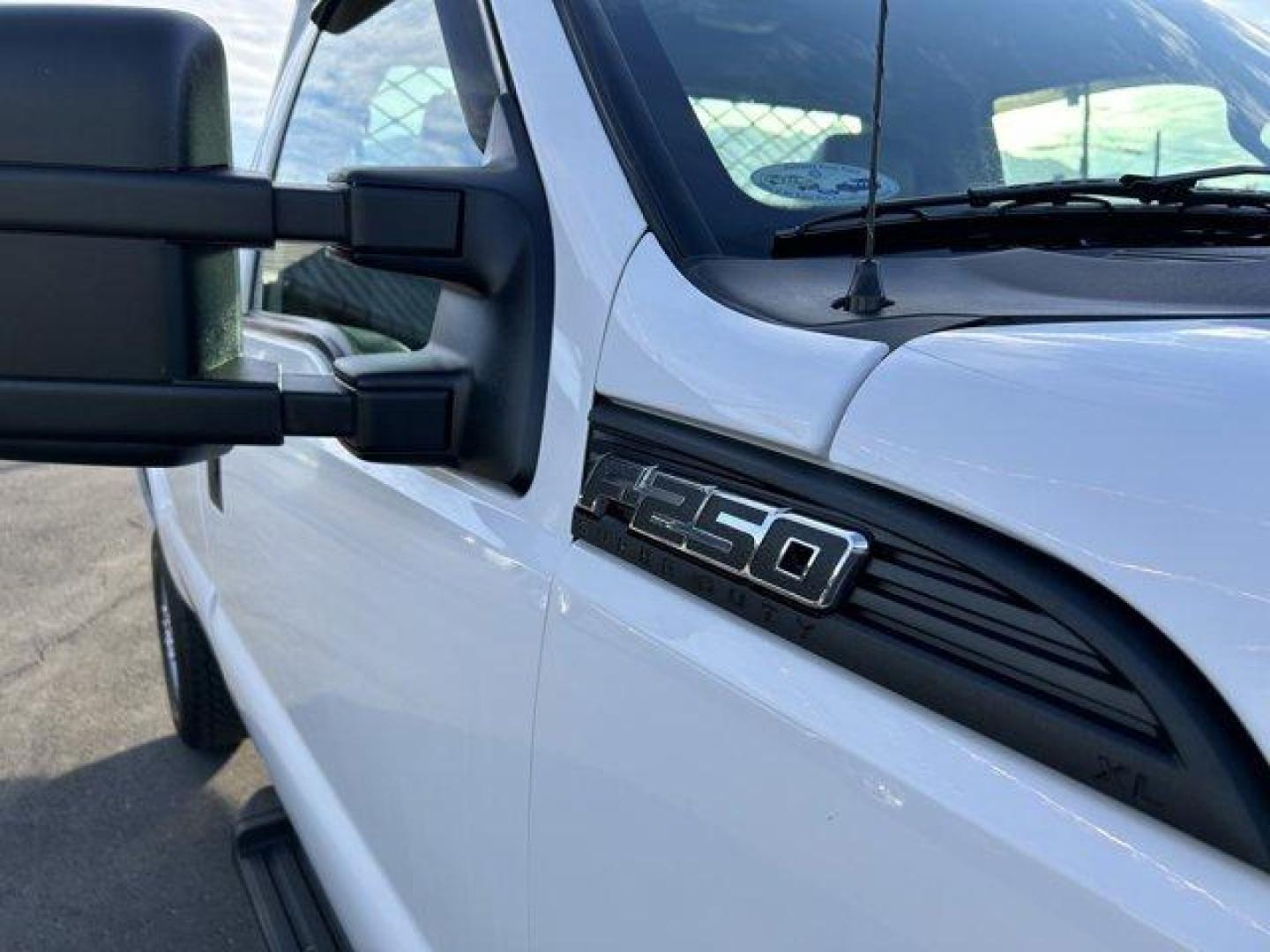 2015 White /gray Ford Super Duty F-250 SRW (1FTBF2B65FE) with an 8 6.2L engine, Automatic transmission, located at 3240 Washington Blvd., Ogden, 84401, (801) 621-7177, 41.204967, -111.969994 - *2015 Ford Super Duty F-250*Command the jobsite in this rock solid *4wd Super Duty with the 6.2L V8 engine!*This super clean truck is outfitted with vinyl seats, cruise control, power windows, locks, and mirrors! It also includes CD player with AUX input, running boards, tow package, spray-in bead l - Photo#9