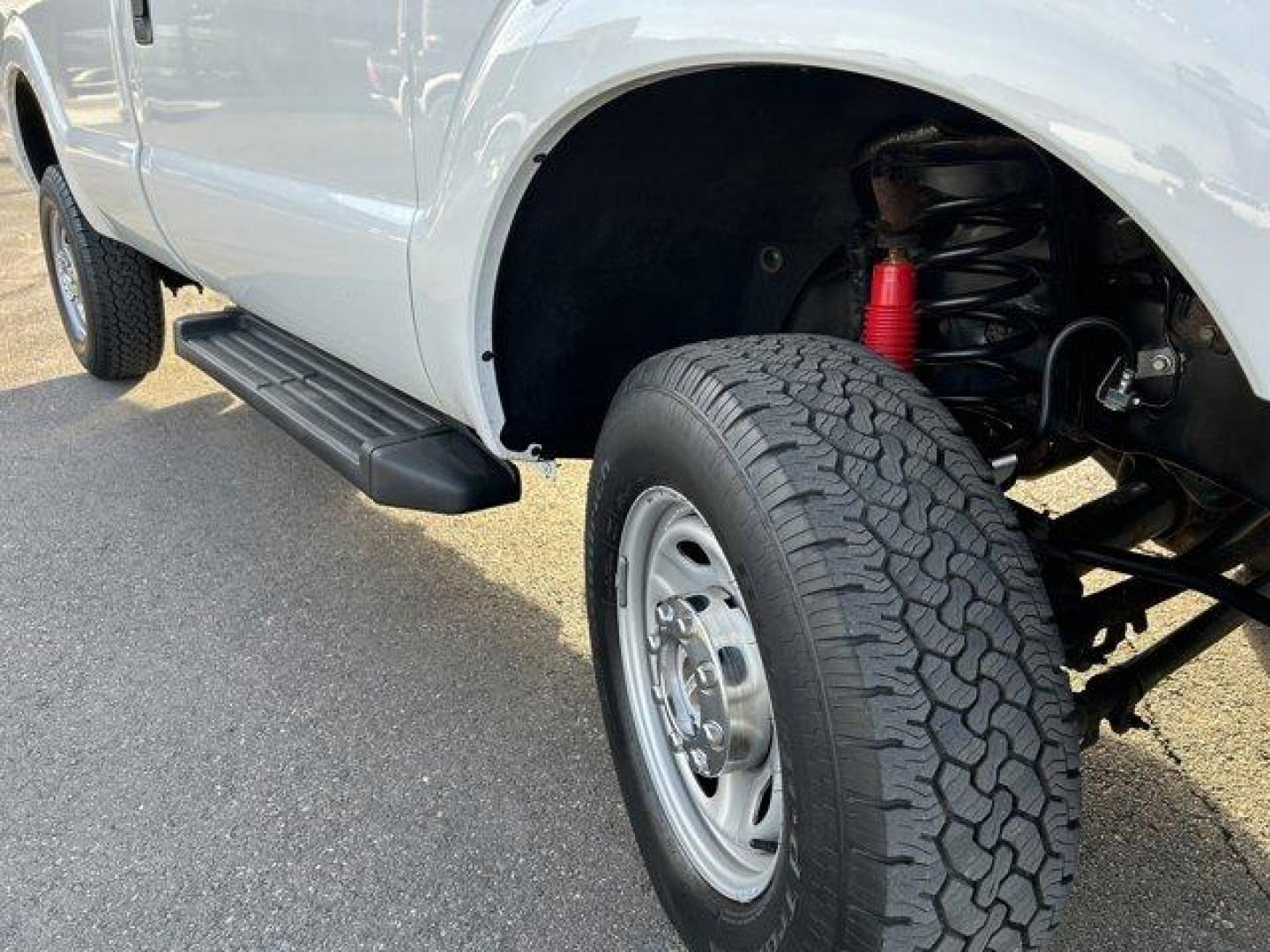 2015 White /gray Ford Super Duty F-250 SRW (1FTBF2B65FE) with an 8 6.2L engine, Automatic transmission, located at 3240 Washington Blvd., Ogden, 84401, (801) 621-7177, 41.204967, -111.969994 - *2015 Ford Super Duty F-250*Command the jobsite in this rock solid *4wd Super Duty with the 6.2L V8 engine!*This super clean truck is outfitted with vinyl seats, cruise control, power windows, locks, and mirrors! It also includes CD player with AUX input, running boards, tow package, spray-in bead l - Photo#10