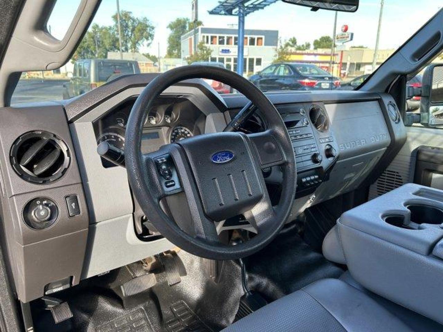 2015 White /gray Ford Super Duty F-250 SRW (1FTBF2B65FE) with an 8 6.2L engine, Automatic transmission, located at 3240 Washington Blvd., Ogden, 84401, (801) 621-7177, 41.204967, -111.969994 - *2015 Ford Super Duty F-250*Command the jobsite in this rock solid *4wd Super Duty with the 6.2L V8 engine!*This super clean truck is outfitted with vinyl seats, cruise control, power windows, locks, and mirrors! It also includes CD player with AUX input, running boards, tow package, spray-in bead l - Photo#14