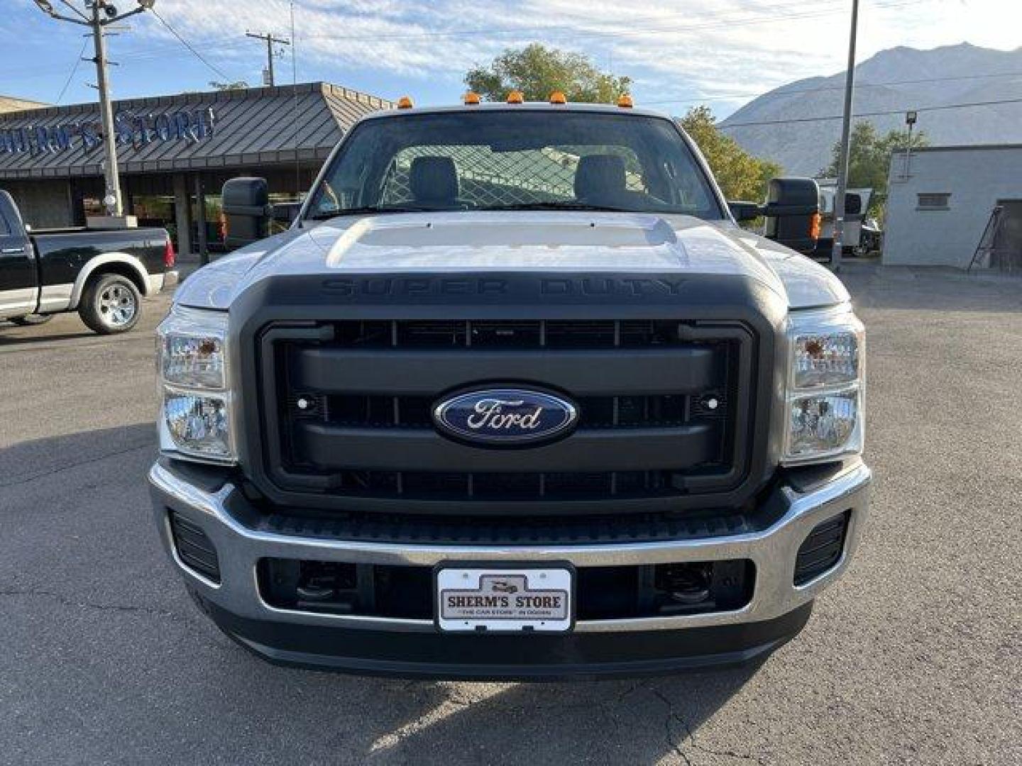 2015 White /gray Ford Super Duty F-250 SRW (1FTBF2B65FE) with an 8 6.2L engine, Automatic transmission, located at 3240 Washington Blvd., Ogden, 84401, (801) 621-7177, 41.204967, -111.969994 - *2015 Ford Super Duty F-250*Command the jobsite in this rock solid *4wd Super Duty with the 6.2L V8 engine!*This super clean truck is outfitted with vinyl seats, cruise control, power windows, locks, and mirrors! It also includes CD player with AUX input, running boards, tow package, spray-in bead l - Photo#1