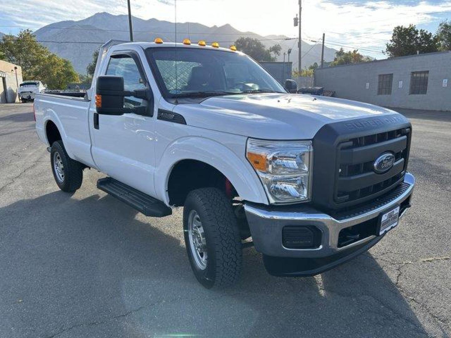 2015 White /gray Ford Super Duty F-250 SRW (1FTBF2B65FE) with an 8 6.2L engine, Automatic transmission, located at 3240 Washington Blvd., Ogden, 84401, (801) 621-7177, 41.204967, -111.969994 - *2015 Ford Super Duty F-250*Command the jobsite in this rock solid *4wd Super Duty with the 6.2L V8 engine!*This super clean truck is outfitted with vinyl seats, cruise control, power windows, locks, and mirrors! It also includes CD player with AUX input, running boards, tow package, spray-in bead l - Photo#2