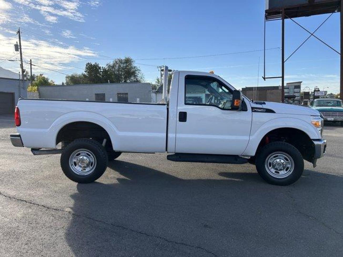 2015 White /gray Ford Super Duty F-250 SRW (1FTBF2B65FE) with an 8 6.2L engine, Automatic transmission, located at 3240 Washington Blvd., Ogden, 84401, (801) 621-7177, 41.204967, -111.969994 - *2015 Ford Super Duty F-250*Command the jobsite in this rock solid *4wd Super Duty with the 6.2L V8 engine!*This super clean truck is outfitted with vinyl seats, cruise control, power windows, locks, and mirrors! It also includes CD player with AUX input, running boards, tow package, spray-in bead l - Photo#3