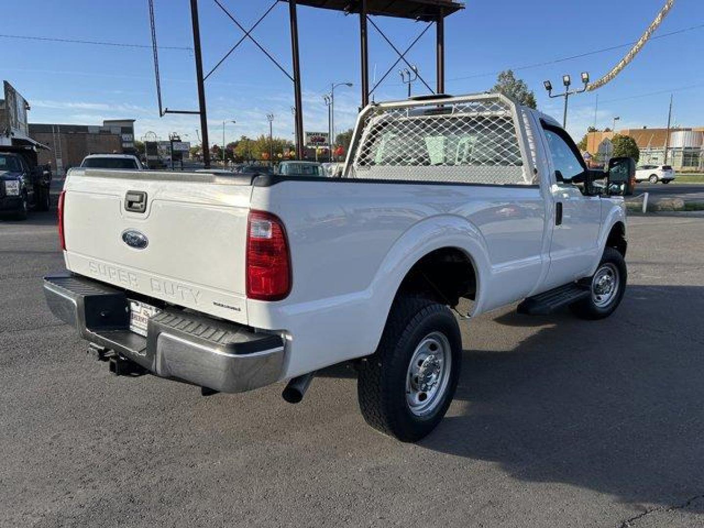 2015 White /gray Ford Super Duty F-250 SRW (1FTBF2B65FE) with an 8 6.2L engine, Automatic transmission, located at 3240 Washington Blvd., Ogden, 84401, (801) 621-7177, 41.204967, -111.969994 - *2015 Ford Super Duty F-250*Command the jobsite in this rock solid *4wd Super Duty with the 6.2L V8 engine!*This super clean truck is outfitted with vinyl seats, cruise control, power windows, locks, and mirrors! It also includes CD player with AUX input, running boards, tow package, spray-in bead l - Photo#4