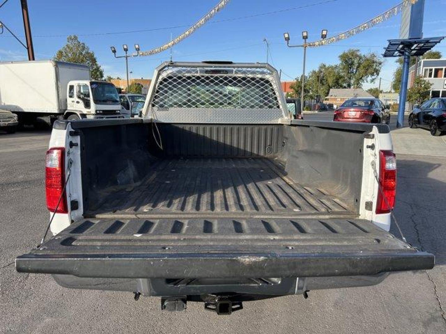 2015 White /gray Ford Super Duty F-250 SRW (1FTBF2B65FE) with an 8 6.2L engine, Automatic transmission, located at 3240 Washington Blvd., Ogden, 84401, (801) 621-7177, 41.204967, -111.969994 - *2015 Ford Super Duty F-250*Command the jobsite in this rock solid *4wd Super Duty with the 6.2L V8 engine!*This super clean truck is outfitted with vinyl seats, cruise control, power windows, locks, and mirrors! It also includes CD player with AUX input, running boards, tow package, spray-in bead l - Photo#6