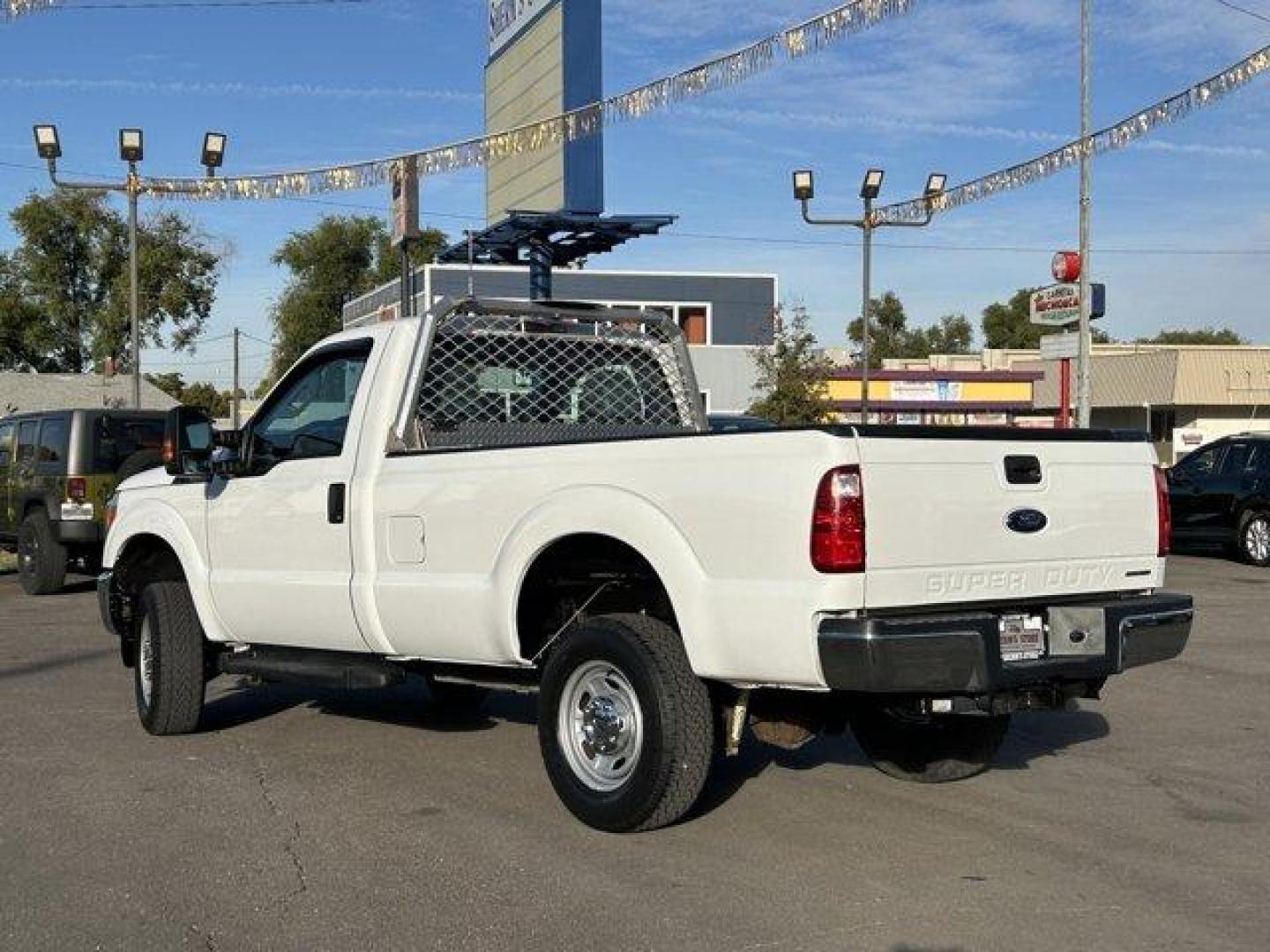 2015 White /gray Ford Super Duty F-250 SRW (1FTBF2B65FE) with an 8 6.2L engine, Automatic transmission, located at 3240 Washington Blvd., Ogden, 84401, (801) 621-7177, 41.204967, -111.969994 - *2015 Ford Super Duty F-250*Command the jobsite in this rock solid *4wd Super Duty with the 6.2L V8 engine!*This super clean truck is outfitted with vinyl seats, cruise control, power windows, locks, and mirrors! It also includes CD player with AUX input, running boards, tow package, spray-in bead l - Photo#7