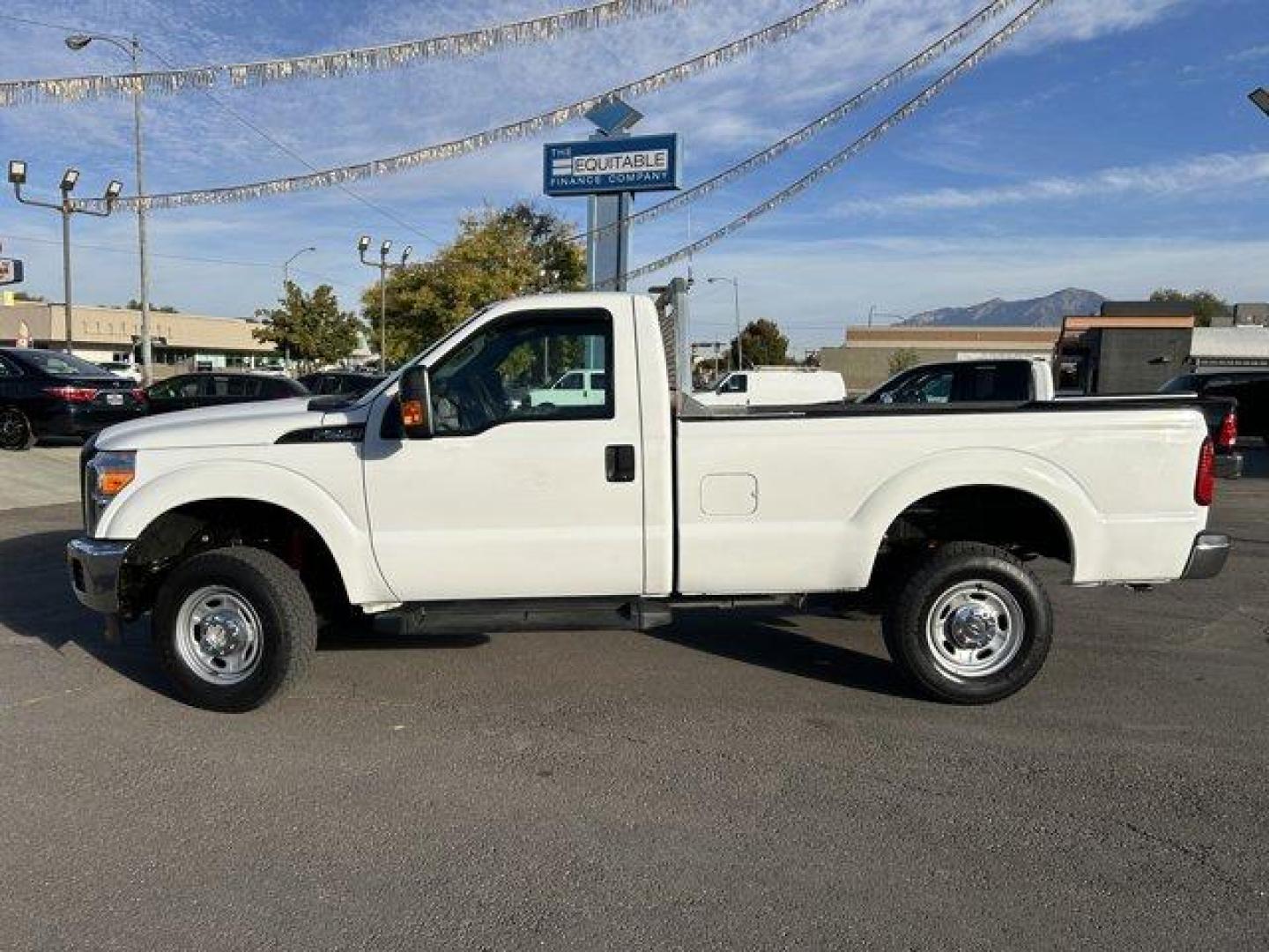 2015 White /gray Ford Super Duty F-250 SRW (1FTBF2B65FE) with an 8 6.2L engine, Automatic transmission, located at 3240 Washington Blvd., Ogden, 84401, (801) 621-7177, 41.204967, -111.969994 - *2015 Ford Super Duty F-250*Command the jobsite in this rock solid *4wd Super Duty with the 6.2L V8 engine!*This super clean truck is outfitted with vinyl seats, cruise control, power windows, locks, and mirrors! It also includes CD player with AUX input, running boards, tow package, spray-in bead l - Photo#8