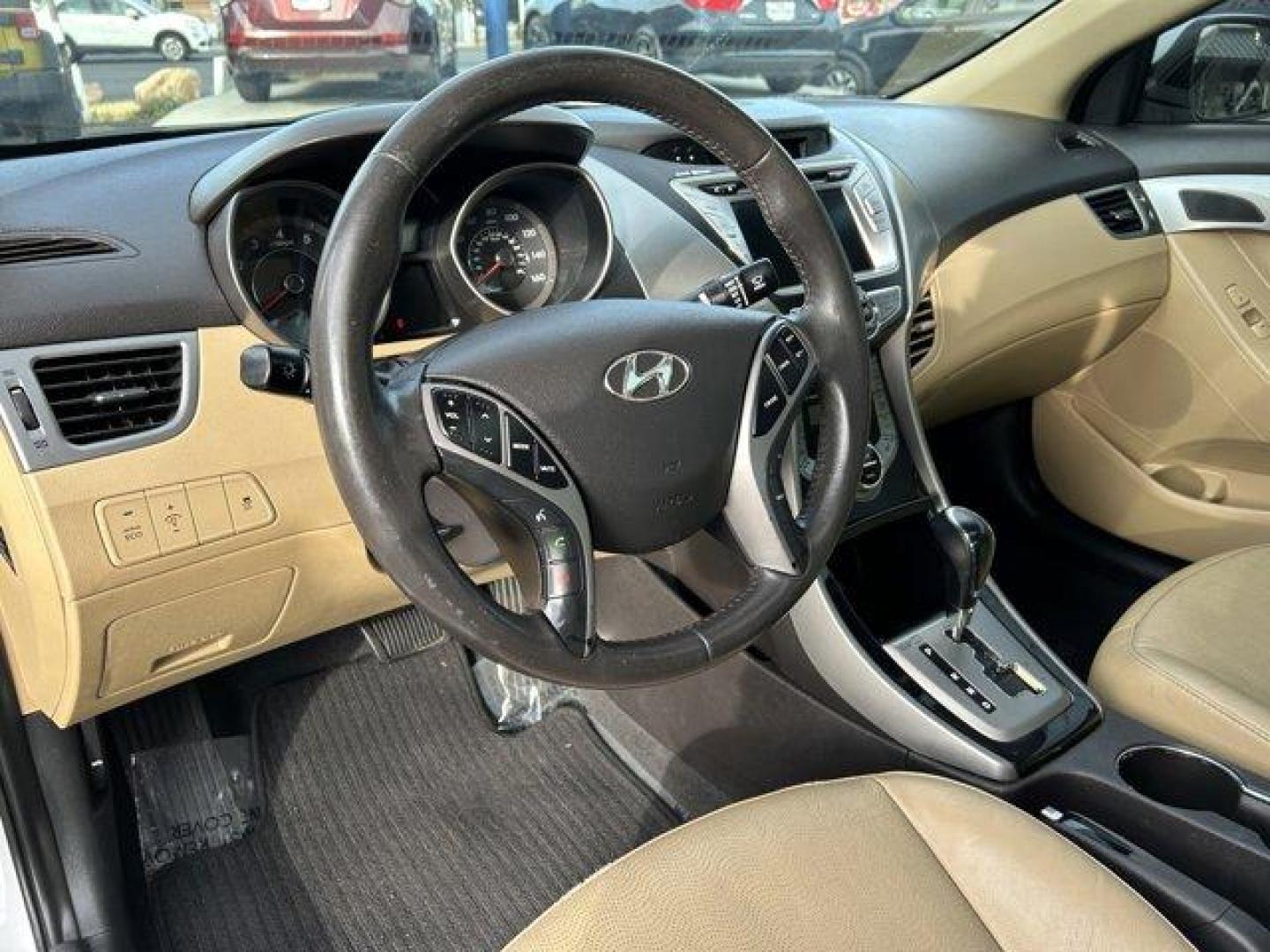 2013 Shimmering White /Beige Hyundai Elantra (5NPDH4AE9DH) with an 4 1.8L engine, Automatic transmission, located at 3240 Washington Blvd., Ogden, 84401, (801) 621-7177, 41.204967, -111.969994 - *2013 Hyundai Elantra Limited** *This sleek Elantra is ready for you! The 1.8L inline 4 engine gives you a nice smooth ride!This is a 2 owner no accidents vehicle and the condition is excellent!You'll feel great driving it with its leather interior, back up camera, power windows, locks and mirrors, - Photo#12