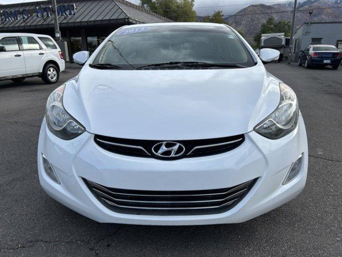 2013 Shimmering White /Beige Hyundai Elantra (5NPDH4AE9DH) with an 4 1.8L engine, Automatic transmission, located at 3240 Washington Blvd., Ogden, 84401, (801) 621-7177, 41.204967, -111.969994 - *2013 Hyundai Elantra Limited** *This sleek Elantra is ready for you! The 1.8L inline 4 engine gives you a nice smooth ride!This is a 2 owner no accidents vehicle and the condition is excellent!You'll feel great driving it with its leather interior, back up camera, power windows, locks and mirrors, - Photo#1