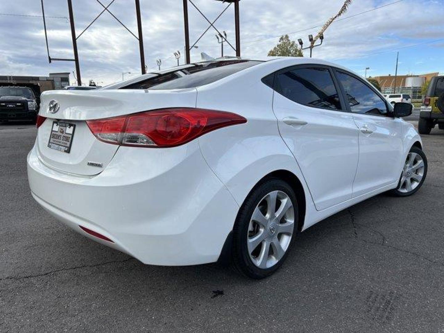 2013 Shimmering White /Beige Hyundai Elantra (5NPDH4AE9DH) with an 4 1.8L engine, Automatic transmission, located at 3240 Washington Blvd., Ogden, 84401, (801) 621-7177, 41.204967, -111.969994 - *2013 Hyundai Elantra Limited** *This sleek Elantra is ready for you! The 1.8L inline 4 engine gives you a nice smooth ride!This is a 2 owner no accidents vehicle and the condition is excellent!You'll feel great driving it with its leather interior, back up camera, power windows, locks and mirrors, - Photo#4