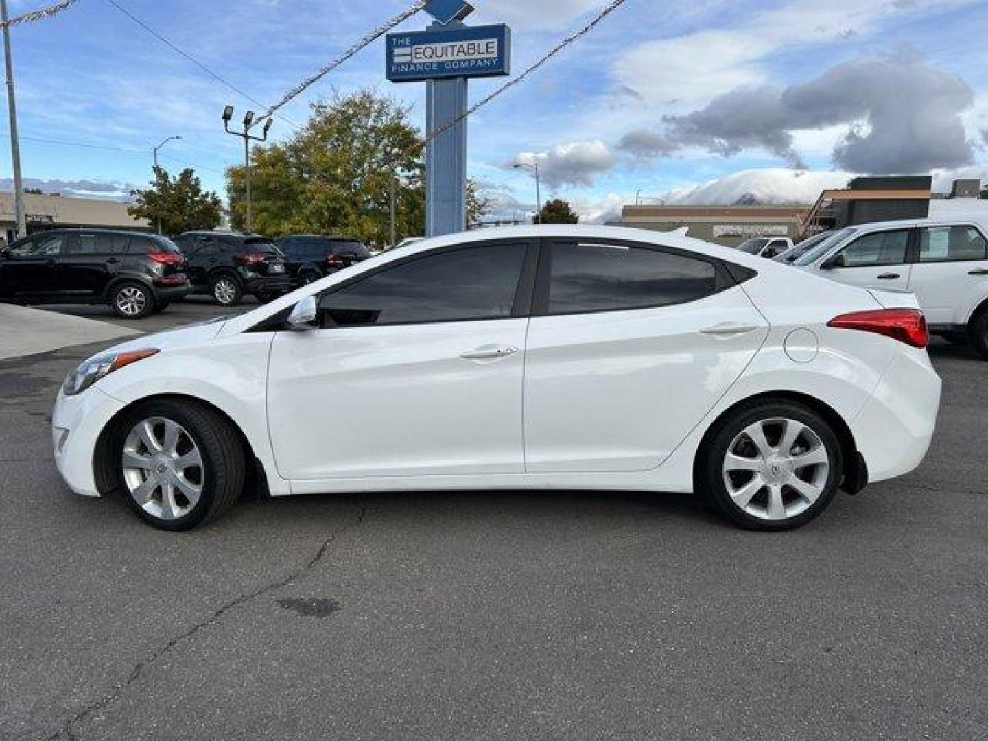 2013 Shimmering White /Beige Hyundai Elantra (5NPDH4AE9DH) with an 4 1.8L engine, Automatic transmission, located at 3240 Washington Blvd., Ogden, 84401, (801) 621-7177, 41.204967, -111.969994 - *2013 Hyundai Elantra Limited** *This sleek Elantra is ready for you! The 1.8L inline 4 engine gives you a nice smooth ride!This is a 2 owner no accidents vehicle and the condition is excellent!You'll feel great driving it with its leather interior, back up camera, power windows, locks and mirrors, - Photo#7