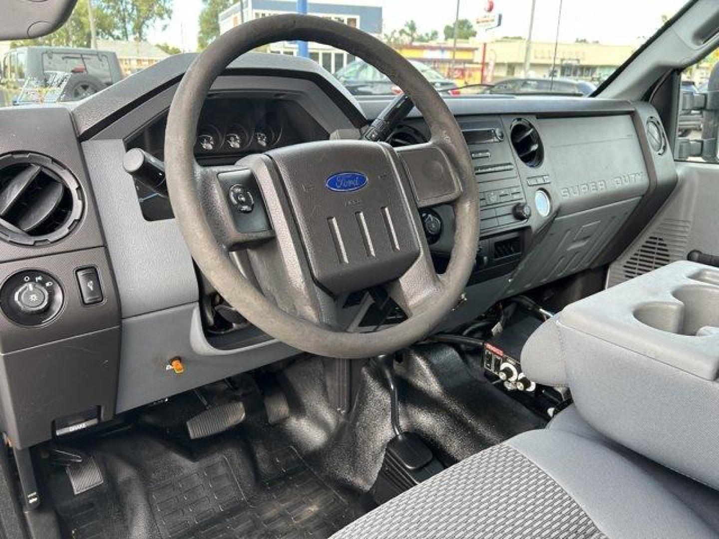 2015 White /gray Ford Super Duty F-250 SRW (1FT7X2B61FE) with an 8 6.2L engine, Automatic transmission, located at 3240 Washington Blvd., Ogden, 84401, (801) 621-7177, 41.204967, -111.969994 - *2015 Ford F-250 4WD Plow*This Super Duty is ready for this winter!! Its a 4 wheel drive extended cab! 1 owner, no accidents, complete with a *headache rack and 2 bed side-mount tool boxes!*You'll make plowing look easy with the *Western Ultra Mount 2 plow and BOSS TGS 800 salter combo!*Sherm's Stor - Photo#15