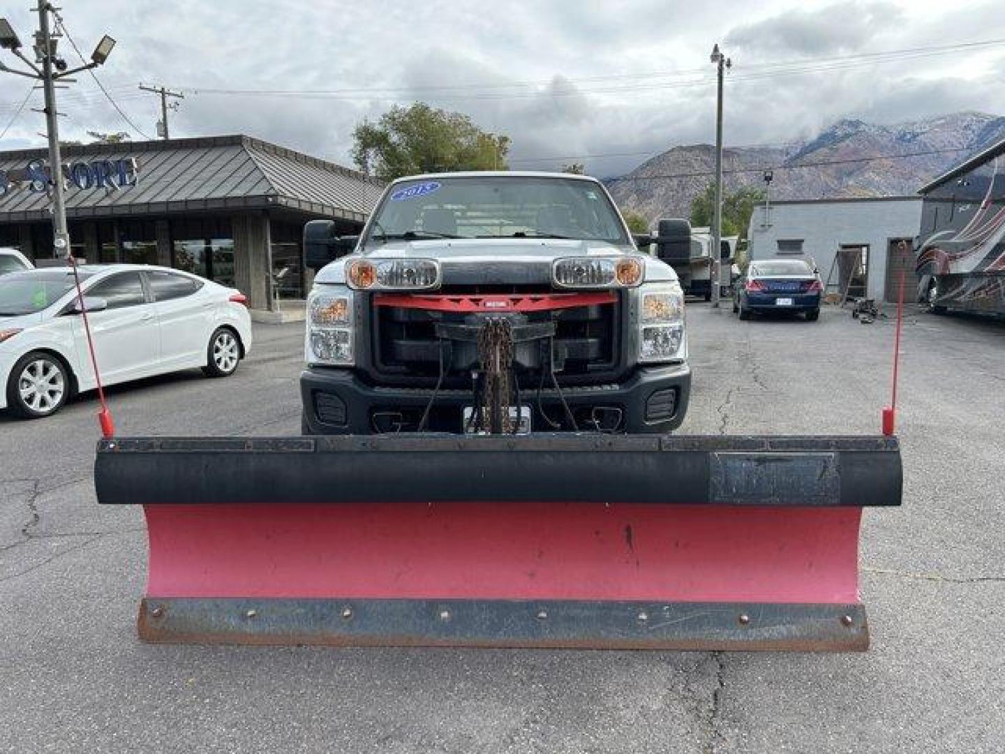 2015 White /gray Ford Super Duty F-250 SRW (1FT7X2B61FE) with an 8 6.2L engine, Automatic transmission, located at 3240 Washington Blvd., Ogden, 84401, (801) 621-7177, 41.204967, -111.969994 - *2015 Ford F-250 4WD Plow*This Super Duty is ready for this winter!! Its a 4 wheel drive extended cab! 1 owner, no accidents, complete with a *headache rack and 2 bed side-mount tool boxes!*You'll make plowing look easy with the *Western Ultra Mount 2 plow and BOSS TGS 800 salter combo!*Sherm's Stor - Photo#1