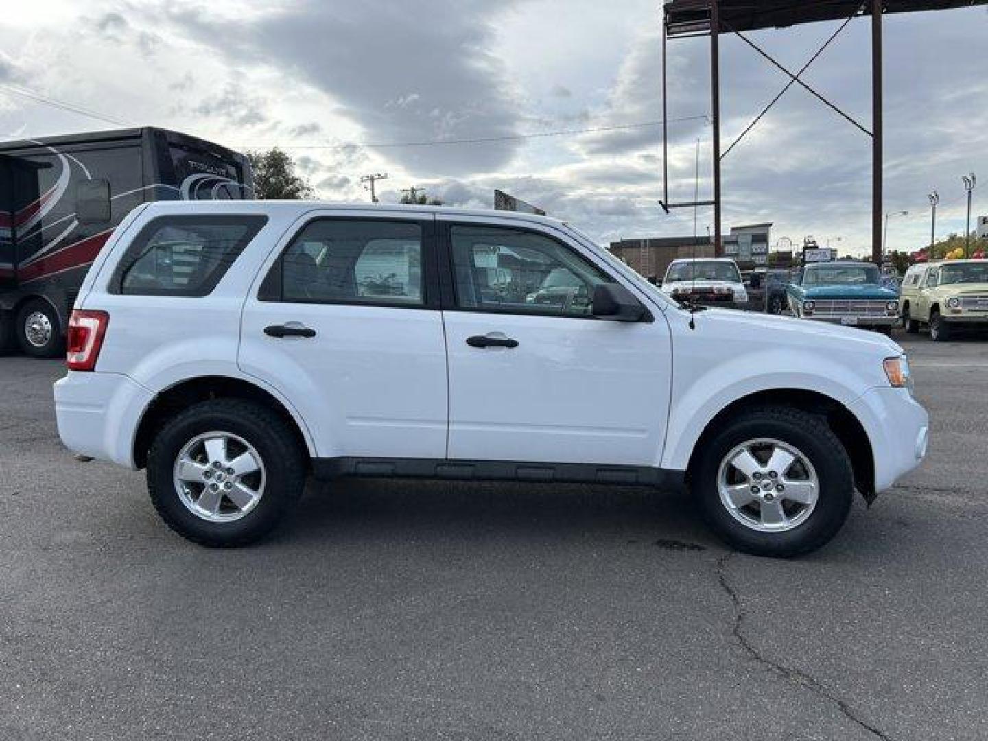 2012 White /Tan/Gray Ford Escape (1FMCU9C74CK) with an 4 2.5L engine, Automatic transmission, located at 3240 Washington Blvd., Ogden, 84401, (801) 621-7177, 41.204967, -111.969994 - *2012 Ford Escape 4WD XLS*This *4-wheel drive* Escape is great for these winter months coming up!! Its a 1 owner vehicle that was very regularly maintained.These *Cooper Discover AT3 tires* have plenty of tread, ready to tackle this winter season with ease.You'll be set outside and in with the *all - Photo#3