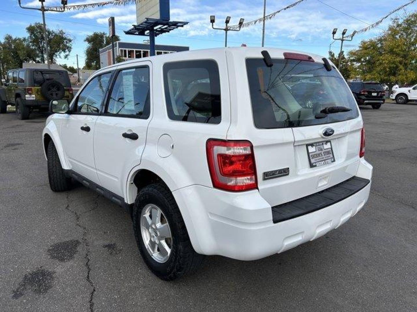 2012 White /Tan/Gray Ford Escape (1FMCU9C74CK) with an 4 2.5L engine, Automatic transmission, located at 3240 Washington Blvd., Ogden, 84401, (801) 621-7177, 41.204967, -111.969994 - *2012 Ford Escape 4WD XLS*This *4-wheel drive* Escape is great for these winter months coming up!! Its a 1 owner vehicle that was very regularly maintained.These *Cooper Discover AT3 tires* have plenty of tread, ready to tackle this winter season with ease.You'll be set outside and in with the *all - Photo#6