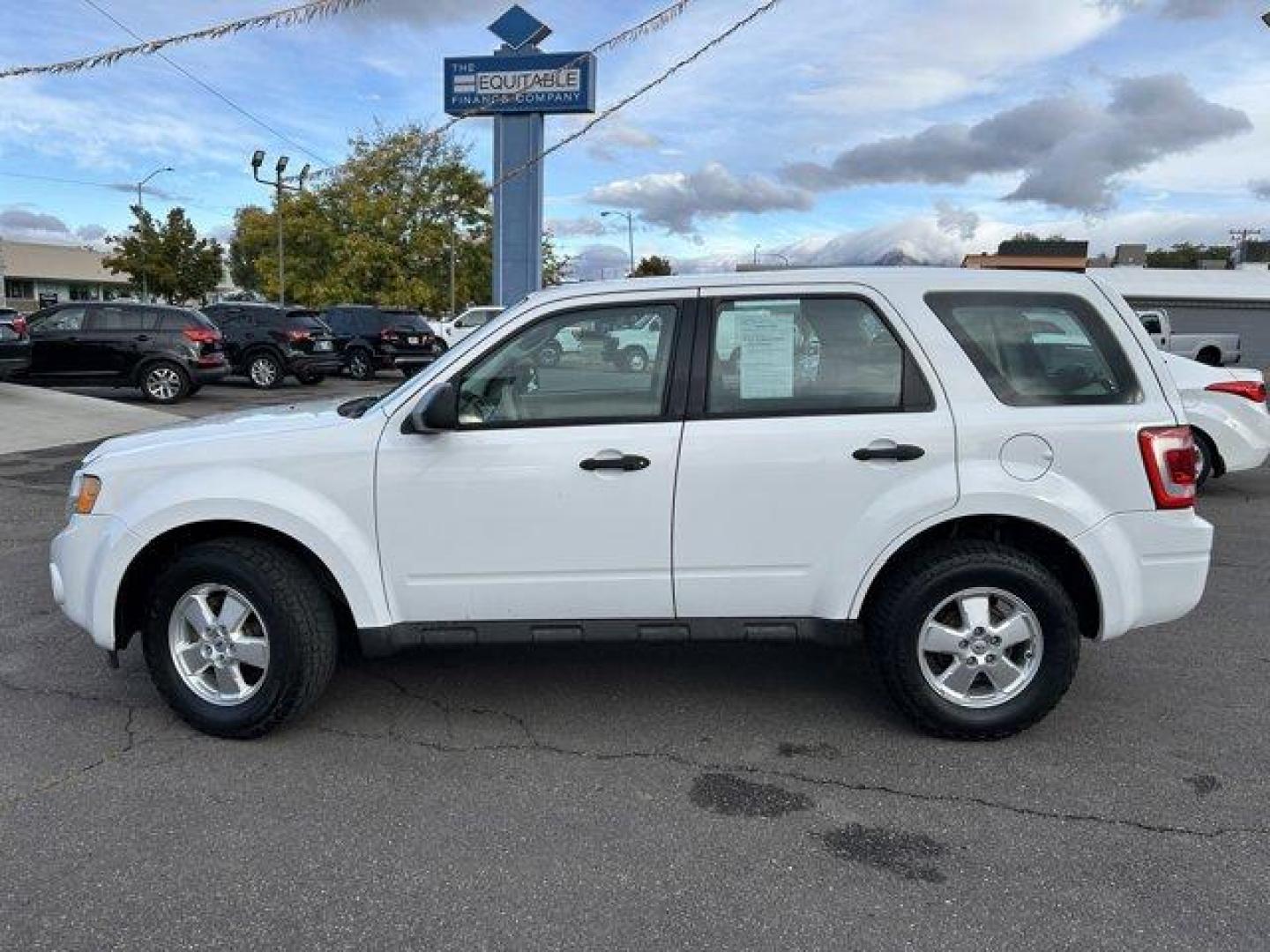 2012 White /Tan/Gray Ford Escape (1FMCU9C74CK) with an 4 2.5L engine, Automatic transmission, located at 3240 Washington Blvd., Ogden, 84401, (801) 621-7177, 41.204967, -111.969994 - *2012 Ford Escape 4WD XLS*This *4-wheel drive* Escape is great for these winter months coming up!! Its a 1 owner vehicle that was very regularly maintained.These *Cooper Discover AT3 tires* have plenty of tread, ready to tackle this winter season with ease.You'll be set outside and in with the *all - Photo#7