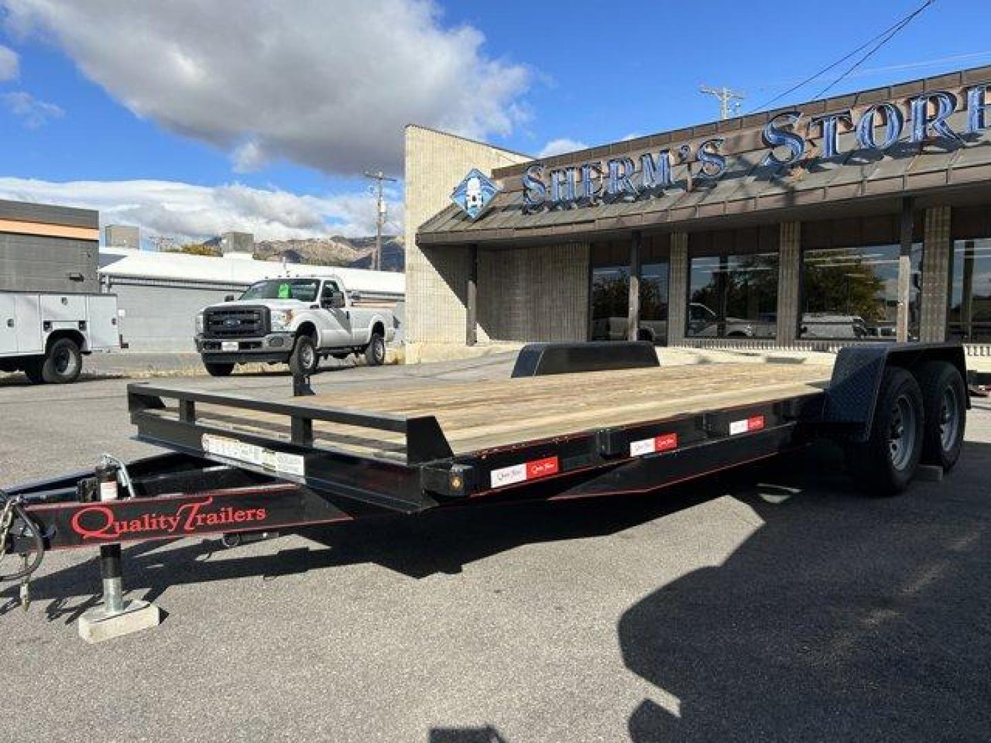 (7RA1A202755) , located at 3240 Washington Blvd., Ogden, 84401, (801) 621-7177, 41.204967, -111.969994 - ====== 2025 Quality Trailers 20ft Tandem Axel Car Hauler- 9990LB GVWR ======Don't miss this like new trailer (used for one trip) at a steal of a price! The deck measures 20 feet long (18' + 2' dovetail by 82 wide between the fenders) The 5' ladder ramps stow in channels under the back of the trailer - Photo#2