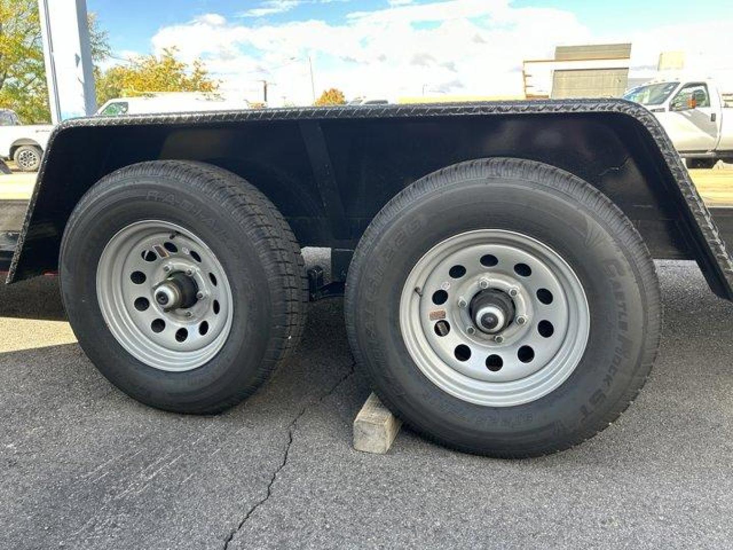 (7RA1A202755) , located at 3240 Washington Blvd., Ogden, 84401, (801) 621-7177, 41.204967, -111.969994 - ====== 2025 Quality Trailers 20ft Tandem Axel Car Hauler- 9990LB GVWR ======Don't miss this like new trailer (used for one trip) at a steal of a price! The deck measures 20 feet long (18' + 2' dovetail by 82 wide between the fenders) The 5' ladder ramps stow in channels under the back of the trailer - Photo#6