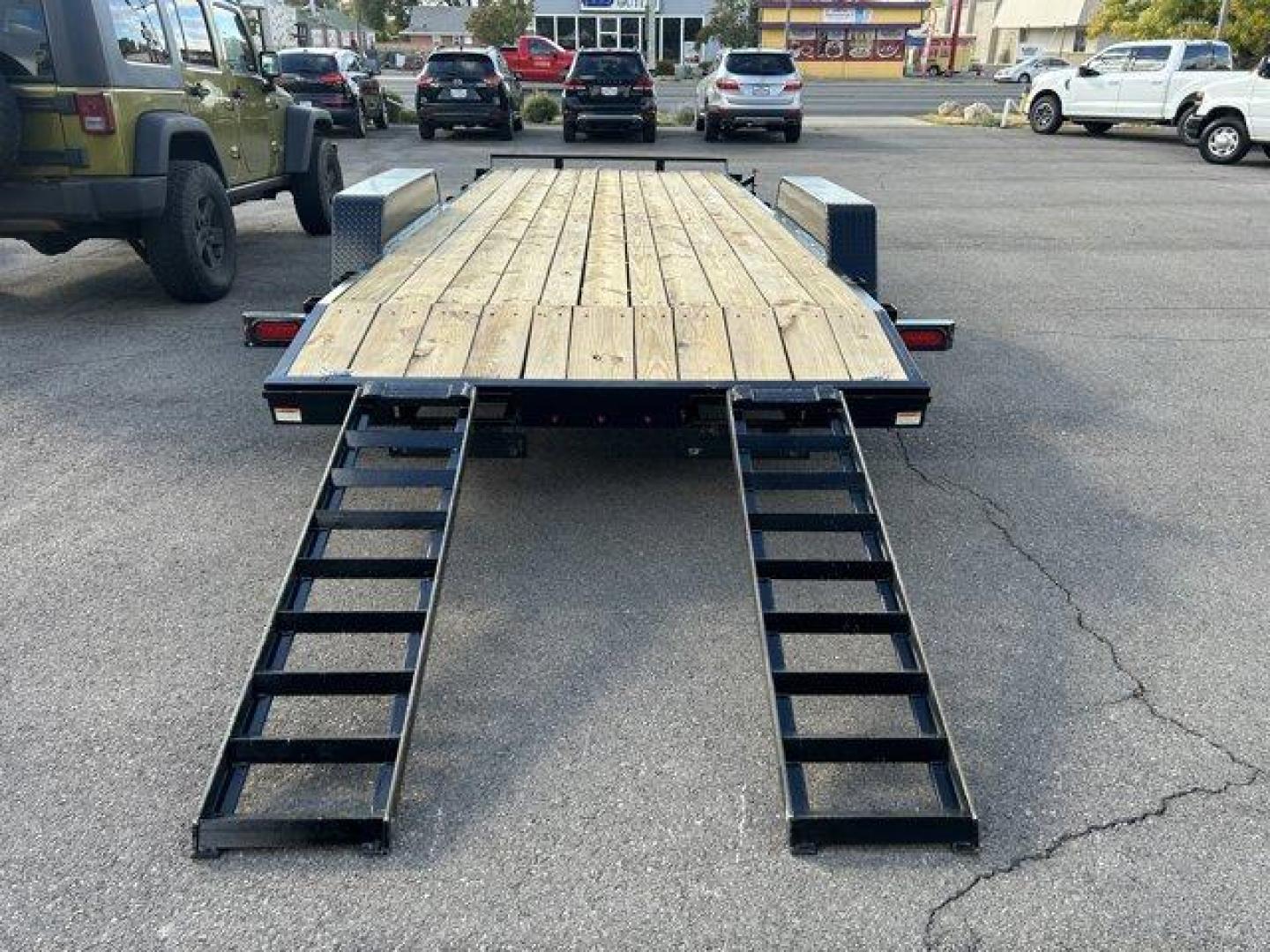 (7RA1A202755) , located at 3240 Washington Blvd., Ogden, 84401, (801) 621-7177, 41.204967, -111.969994 - ====== 2025 Quality Trailers 20ft Tandem Axel Car Hauler- 9990LB GVWR ======Don't miss this like new trailer (used for one trip) at a steal of a price! The deck measures 20 feet long (18' + 2' dovetail by 82 wide between the fenders) The 5' ladder ramps stow in channels under the back of the trailer - Photo#8