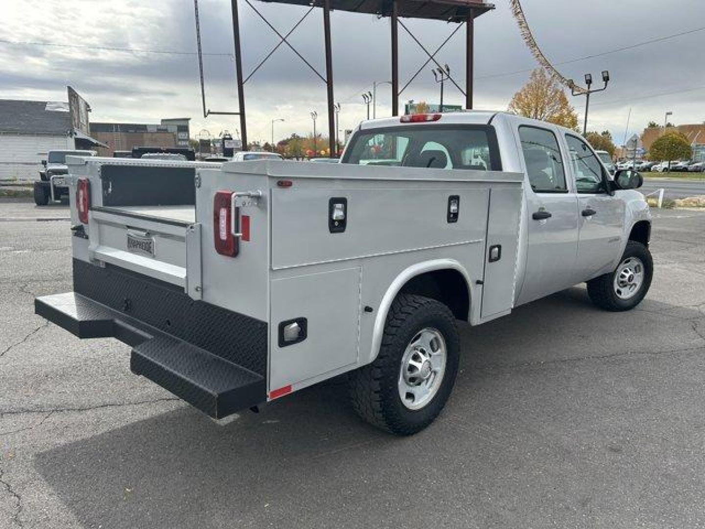 2013 Quicksilver Metallic /Dark Titanium GMC Sierra 2500HD (1GT12ZCG3DF) with an 8 6.0L engine, Automatic transmission, located at 3240 Washington Blvd., Ogden, 84401, (801) 621-7177, 41.204967, -111.969994 - *2013 GMC Sierra 2500HD Work Truck*Discover the rugged reliability of this 2013 GMC Sierra 2500HD 4WD Crew Cab Work Truck. This heavy-duty truck is designed to handle the toughest jobs while providing comfort and versatility for all your worksite needs.*Key Features:* * *Powerful Performance:* Powe - Photo#4