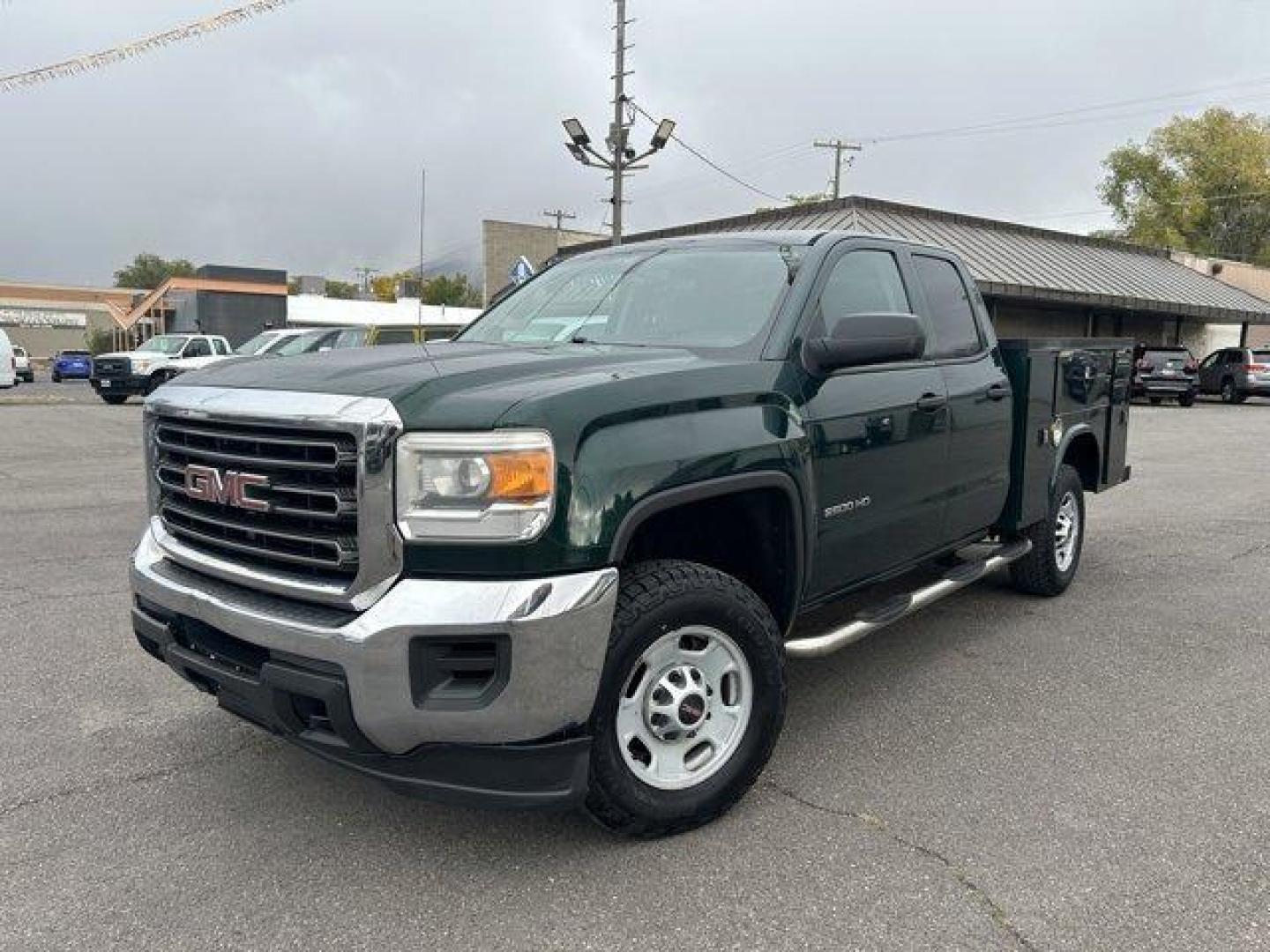 2015 Green /Jet Black/Dark Ash GMC Sierra 2500HD (1GT22XEG5FZ) with an 8 6.0L engine, Automatic transmission, located at 3240 Washington Blvd., Ogden, 84401, (801) 621-7177, 41.204967, -111.969994 - *2015 GMC Sierra 2500HD*Come check out this green machine!! This 2015 utility truck is loaded with features inside and out!! The Knapheide utility bed has a total of 8 compartments ready for all your gear! it also features a dual-locking system with locks on the compartments and a bar that will lock - Photo#0