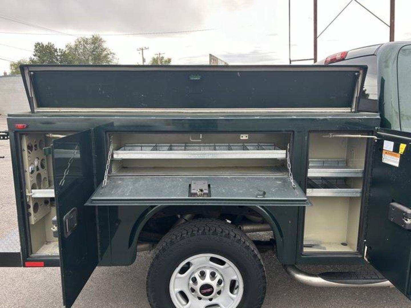 2015 Green /Jet Black/Dark Ash GMC Sierra 2500HD (1GT22XEG5FZ) with an 8 6.0L engine, Automatic transmission, located at 3240 Washington Blvd., Ogden, 84401, (801) 621-7177, 41.204967, -111.969994 - *2015 GMC Sierra 2500HD*Come check out this green machine!! This 2015 utility truck is loaded with features inside and out!! The Knapheide utility bed has a total of 8 compartments ready for all your gear! it also features a dual-locking system with locks on the compartments and a bar that will lock - Photo#11