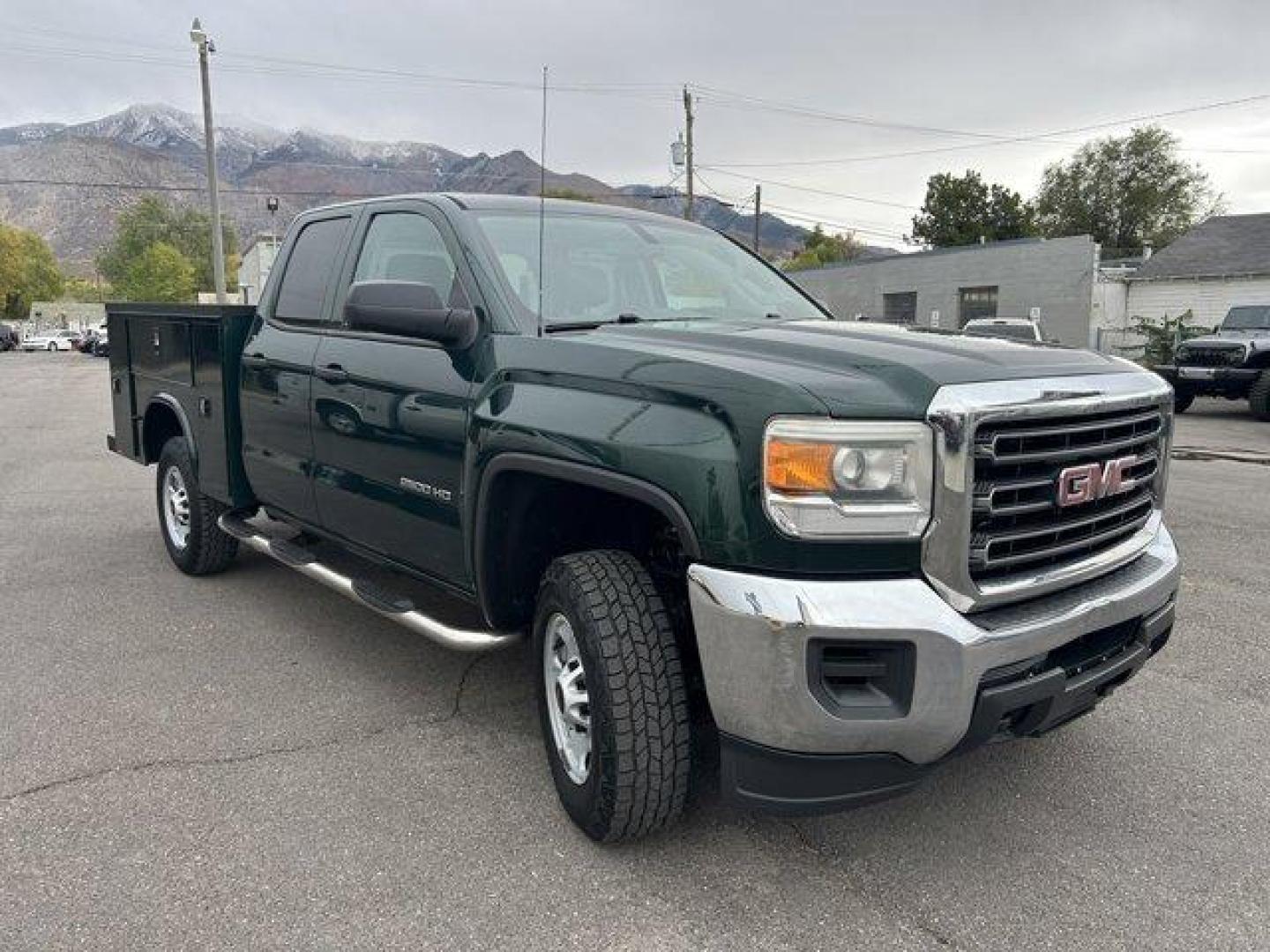 2015 Green /Jet Black/Dark Ash GMC Sierra 2500HD (1GT22XEG5FZ) with an 8 6.0L engine, Automatic transmission, located at 3240 Washington Blvd., Ogden, 84401, (801) 621-7177, 41.204967, -111.969994 - *2015 GMC Sierra 2500HD*Come check out this green machine!! This 2015 utility truck is loaded with features inside and out!! The Knapheide utility bed has a total of 8 compartments ready for all your gear! it also features a dual-locking system with locks on the compartments and a bar that will lock - Photo#2