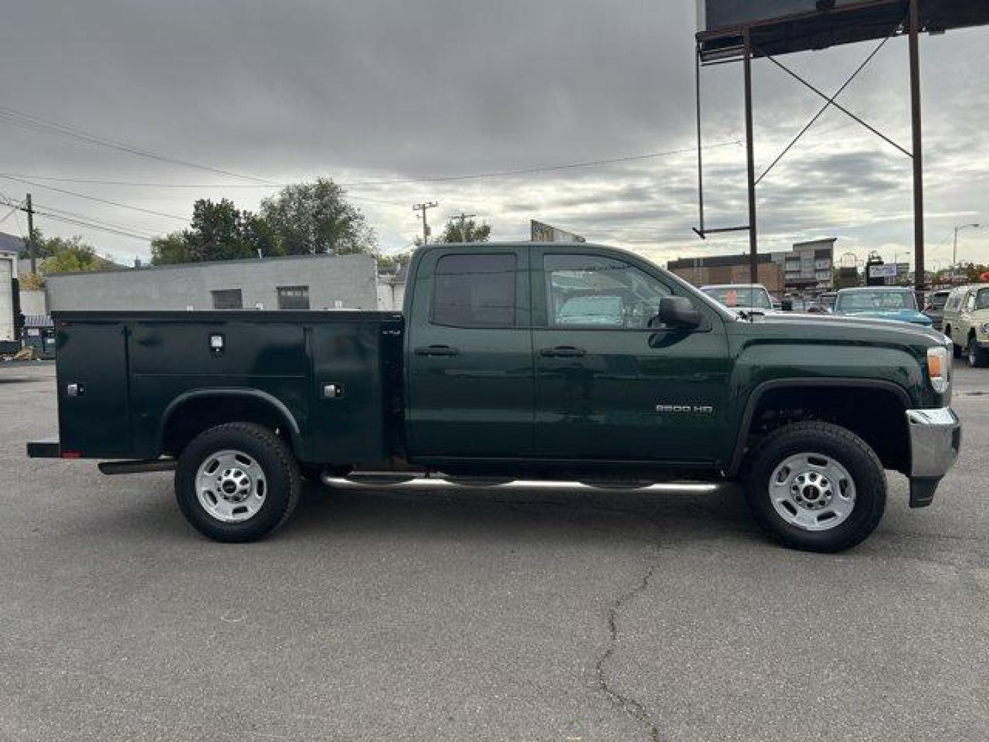 2015 Green /Jet Black/Dark Ash GMC Sierra 2500HD (1GT22XEG5FZ) with an 8 6.0L engine, Automatic transmission, located at 3240 Washington Blvd., Ogden, 84401, (801) 621-7177, 41.204967, -111.969994 - *2015 GMC Sierra 2500HD*Come check out this green machine!! This 2015 utility truck is loaded with features inside and out!! The Knapheide utility bed has a total of 8 compartments ready for all your gear! it also features a dual-locking system with locks on the compartments and a bar that will lock - Photo#3