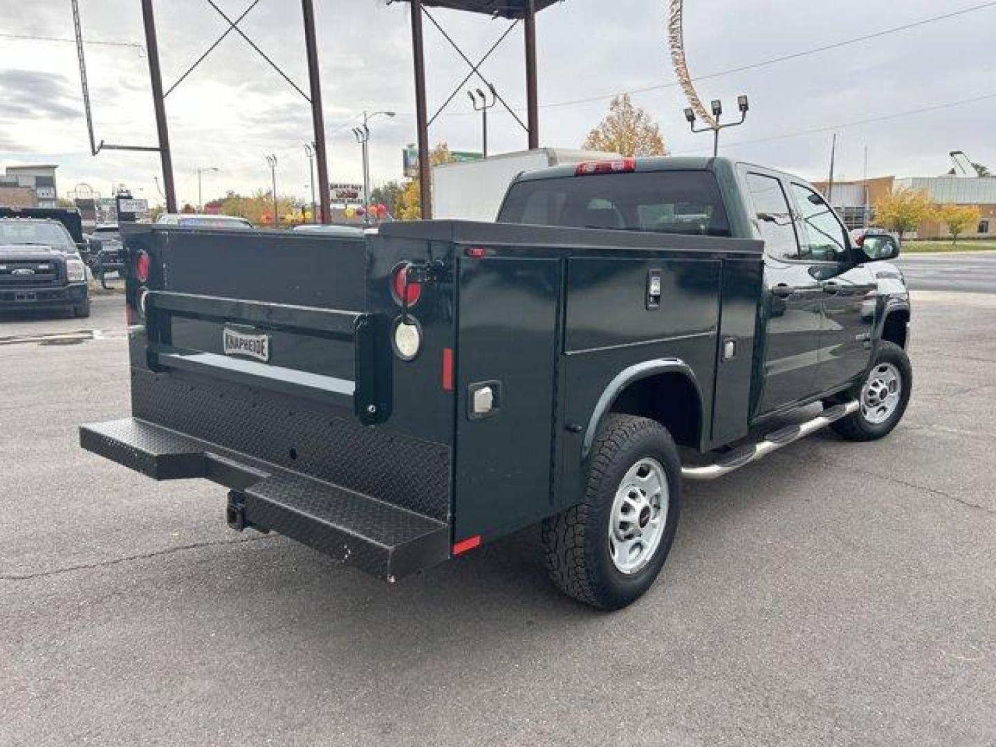 2015 Green /Jet Black/Dark Ash GMC Sierra 2500HD (1GT22XEG5FZ) with an 8 6.0L engine, Automatic transmission, located at 3240 Washington Blvd., Ogden, 84401, (801) 621-7177, 41.204967, -111.969994 - *2015 GMC Sierra 2500HD*Come check out this green machine!! This 2015 utility truck is loaded with features inside and out!! The Knapheide utility bed has a total of 8 compartments ready for all your gear! it also features a dual-locking system with locks on the compartments and a bar that will lock - Photo#4