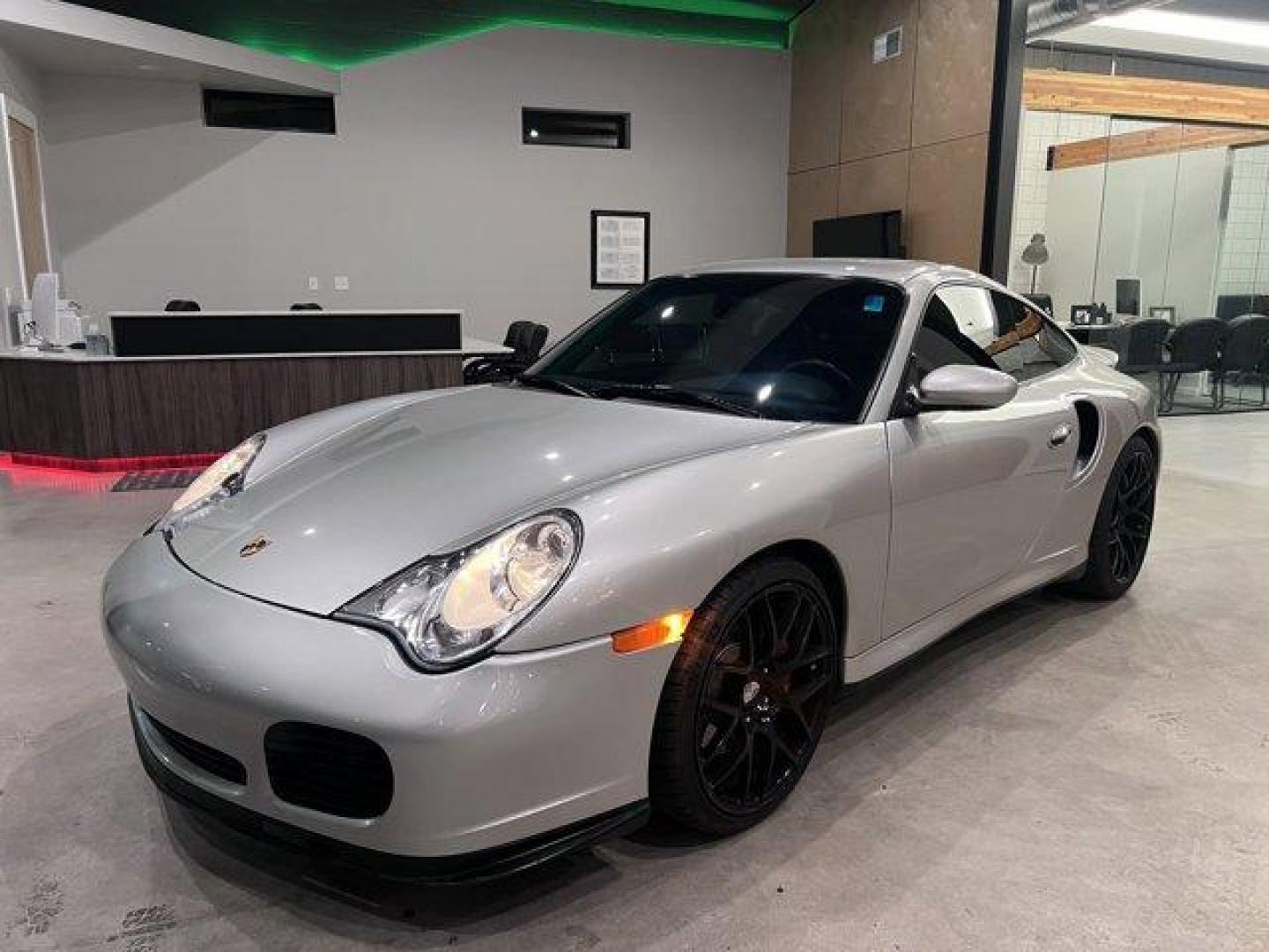 2003 Silver /Black Porsche 911 Carrera (WP0AB29993S) with an 6 3.6L engine, Manual transmission, located at 3240 Washington Blvd., Ogden, 84401, (801) 621-7177, 41.204967, -111.969994 - *2003 Porsche 911 Carrera Turbo 2-Door -- A Classic Icon with Low Miles, Aftermarket Upgrades, and Pure Driving Thrills!*Unleash the full power of driving with this *2003 Porsche 911 Carrera Turbo*. With just *29,352 miles*, this stunning sports car is a true performance machine, featuring a *6-spee - Photo#1