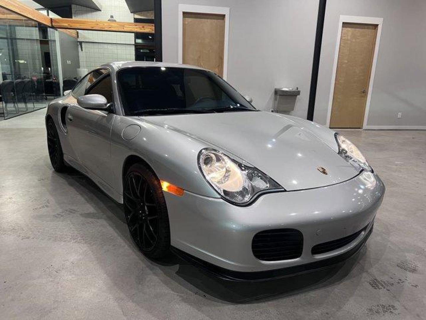 2003 Silver /Black Porsche 911 Carrera (WP0AB29993S) with an 6 3.6L engine, Manual transmission, located at 3240 Washington Blvd., Ogden, 84401, (801) 621-7177, 41.204967, -111.969994 - *2003 Porsche 911 Carrera Turbo 2-Door -- A Classic Icon with Low Miles, Aftermarket Upgrades, and Pure Driving Thrills!*Unleash the full power of driving with this *2003 Porsche 911 Carrera Turbo*. With just *29,352 miles*, this stunning sports car is a true performance machine, featuring a *6-spee - Photo#7