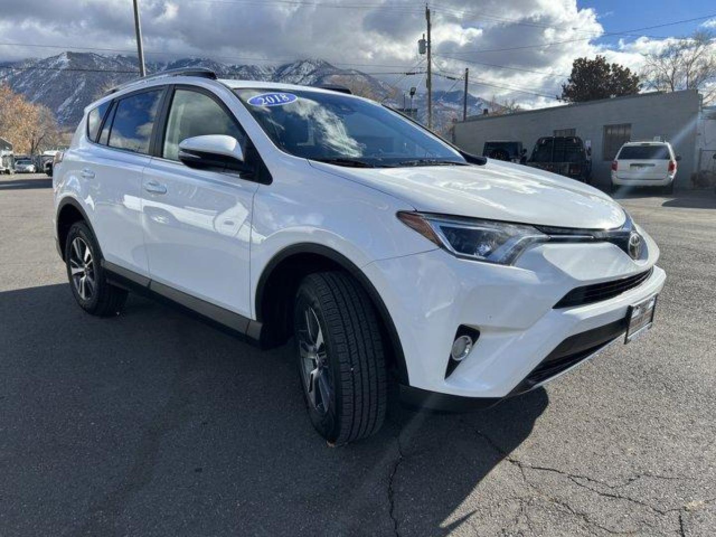 2018 White /Black Toyota RAV4 (2T3RFREV1JW) with an 4 2.5 L engine, Automatic transmission, located at 3240 Washington Blvd., Ogden, 84401, (801) 621-7177, 41.204967, -111.969994 - *2018 Toyota RAV4 XLE AWD*This 2018 Toyota RAV4 XLE AWD offers a perfect balance of style, performance, and reliability. With its sleek, rugged exterior and spacious, feature-packed interior, it's the ideal compact SUV for both everyday driving and adventurous trips. The RAV4 combines advanced techn - Photo#2