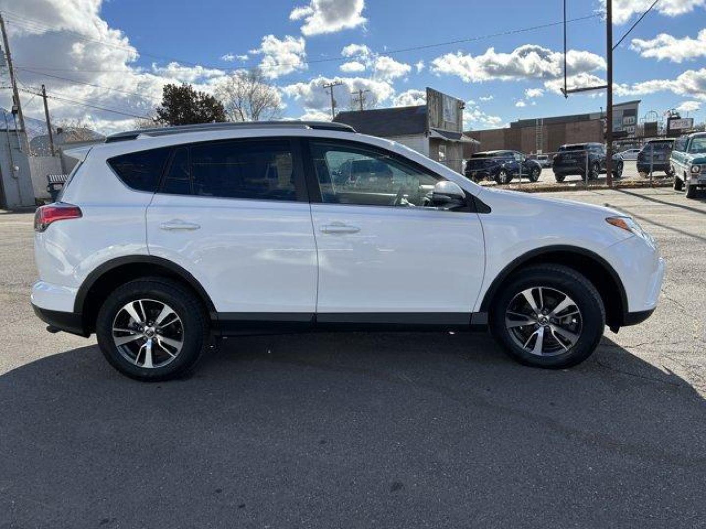 2018 White /Black Toyota RAV4 (2T3RFREV1JW) with an 4 2.5 L engine, Automatic transmission, located at 3240 Washington Blvd., Ogden, 84401, (801) 621-7177, 41.204967, -111.969994 - *2018 Toyota RAV4 XLE AWD*This 2018 Toyota RAV4 XLE AWD offers a perfect balance of style, performance, and reliability. With its sleek, rugged exterior and spacious, feature-packed interior, it's the ideal compact SUV for both everyday driving and adventurous trips. The RAV4 combines advanced techn - Photo#3