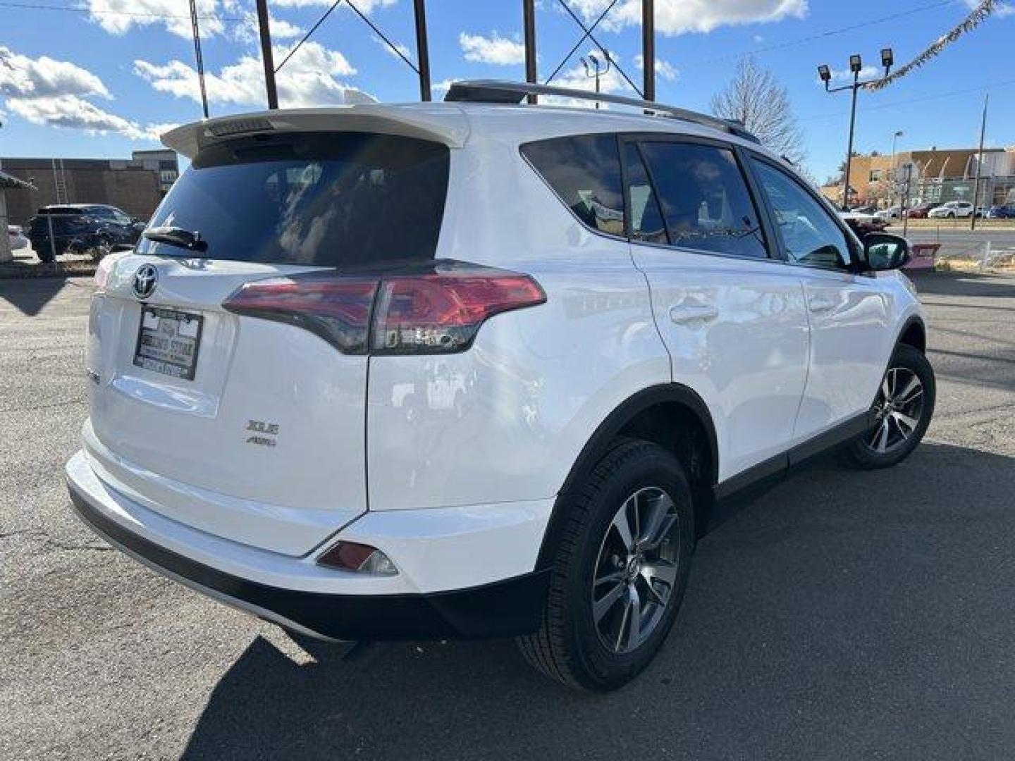 2018 White /Black Toyota RAV4 (2T3RFREV1JW) with an 4 2.5 L engine, Automatic transmission, located at 3240 Washington Blvd., Ogden, 84401, (801) 621-7177, 41.204967, -111.969994 - *2018 Toyota RAV4 XLE AWD*This 2018 Toyota RAV4 XLE AWD offers a perfect balance of style, performance, and reliability. With its sleek, rugged exterior and spacious, feature-packed interior, it's the ideal compact SUV for both everyday driving and adventurous trips. The RAV4 combines advanced techn - Photo#4