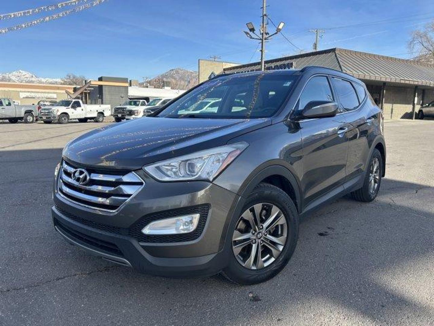 2014 Cabo Bronze /Beige Hyundai Santa Fe Sport (5XYZU3LB4EG) with an 4 2.4 L engine, Automatic transmission, located at 3240 Washington Blvd., Ogden, 84401, (801) 621-7177, 41.204967, -111.969994 - Get ready to experience the perfect blend of style, performance, and reliability with this 2014 Hyundai Santa Fe Sport FWD 4dr 2.4! With 135,913 miles on the odometer, this well-maintained midsize SUV still has plenty of adventure left to offer. Powered by a 2.4-liter 4-cylinder engine, it delivers - Photo#0