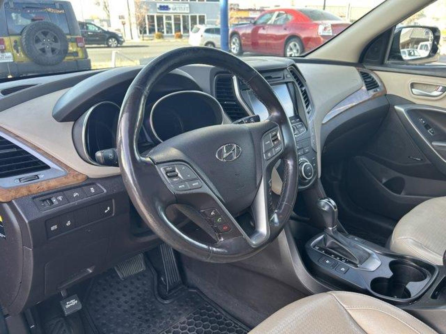 2014 Cabo Bronze /Beige Hyundai Santa Fe Sport (5XYZU3LB4EG) with an 4 2.4 L engine, Automatic transmission, located at 3240 Washington Blvd., Ogden, 84401, (801) 621-7177, 41.204967, -111.969994 - Get ready to experience the perfect blend of style, performance, and reliability with this 2014 Hyundai Santa Fe Sport FWD 4dr 2.4! With 135,913 miles on the odometer, this well-maintained midsize SUV still has plenty of adventure left to offer. Powered by a 2.4-liter 4-cylinder engine, it delivers - Photo#13