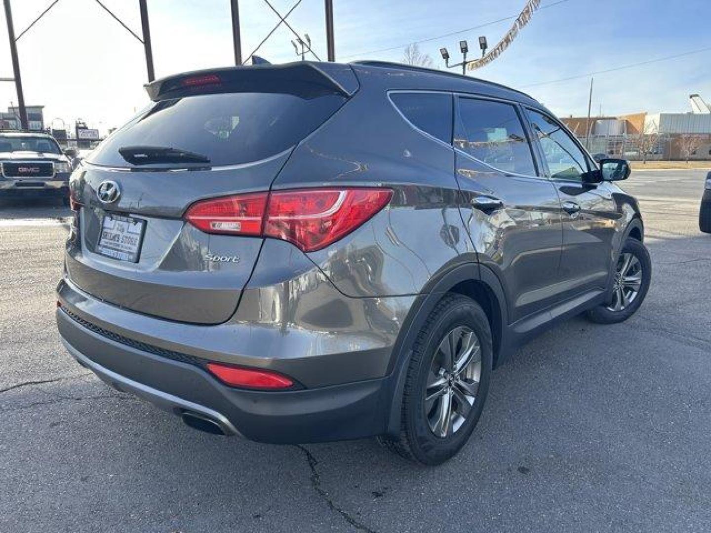 2014 Cabo Bronze /Beige Hyundai Santa Fe Sport (5XYZU3LB4EG) with an 4 2.4 L engine, Automatic transmission, located at 3240 Washington Blvd., Ogden, 84401, (801) 621-7177, 41.204967, -111.969994 - Get ready to experience the perfect blend of style, performance, and reliability with this 2014 Hyundai Santa Fe Sport FWD 4dr 2.4! With 135,913 miles on the odometer, this well-maintained midsize SUV still has plenty of adventure left to offer. Powered by a 2.4-liter 4-cylinder engine, it delivers - Photo#4