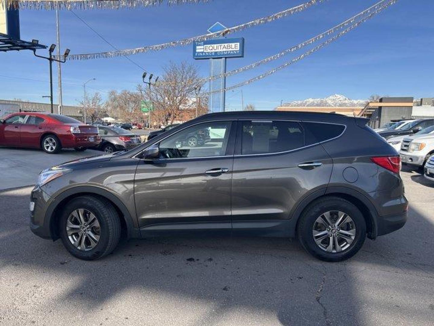 2014 Cabo Bronze /Beige Hyundai Santa Fe Sport (5XYZU3LB4EG) with an 4 2.4 L engine, Automatic transmission, located at 3240 Washington Blvd., Ogden, 84401, (801) 621-7177, 41.204967, -111.969994 - Get ready to experience the perfect blend of style, performance, and reliability with this 2014 Hyundai Santa Fe Sport FWD 4dr 2.4! With 135,913 miles on the odometer, this well-maintained midsize SUV still has plenty of adventure left to offer. Powered by a 2.4-liter 4-cylinder engine, it delivers - Photo#7